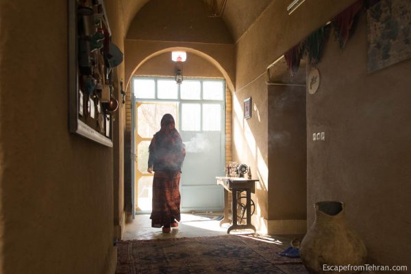 Tina Shohrat at Nartitee Ecolodge, cleansing the rooms with the smoke of sage and other herbs used by Zoroastrians.